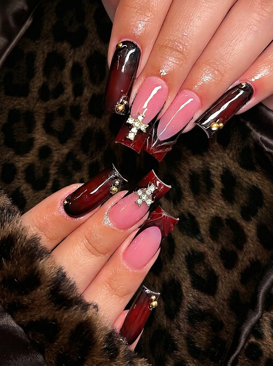 Dark cherry French tips with gold accents